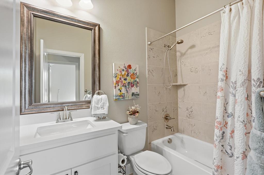 813 Mildren Lane Fate, TX 75087 - Photo 19 of 32 This is the front bathroom which is adjacent to the front bedroom and also has a linen closet in the hall.