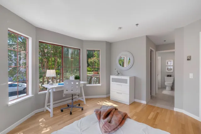 a room with furniture and a window