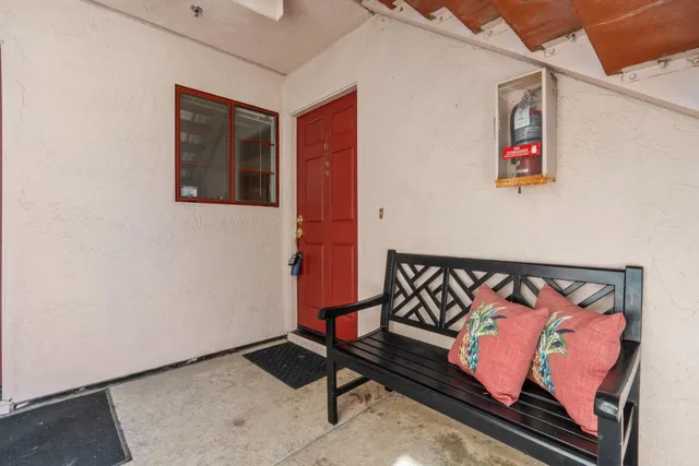 a view of a hallway with a couch