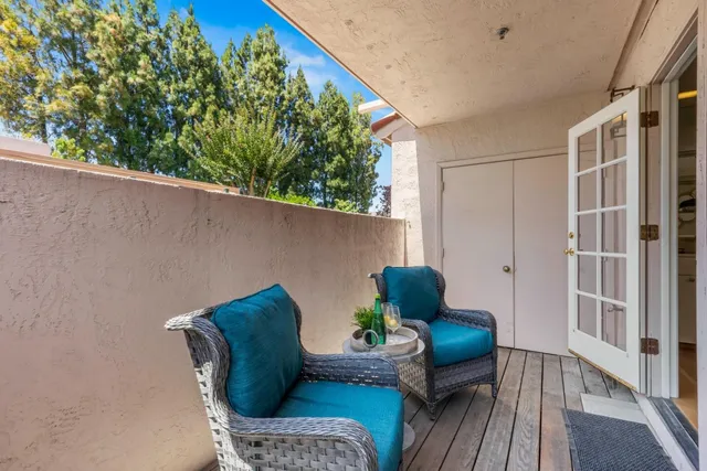 a building outdoor space with patio furniture