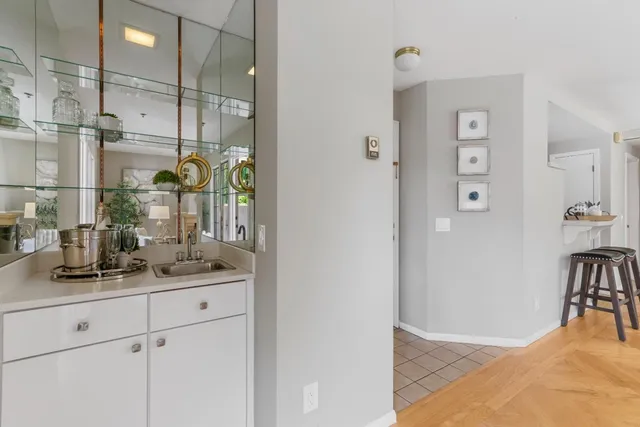 a bathroom with a sink and mirror