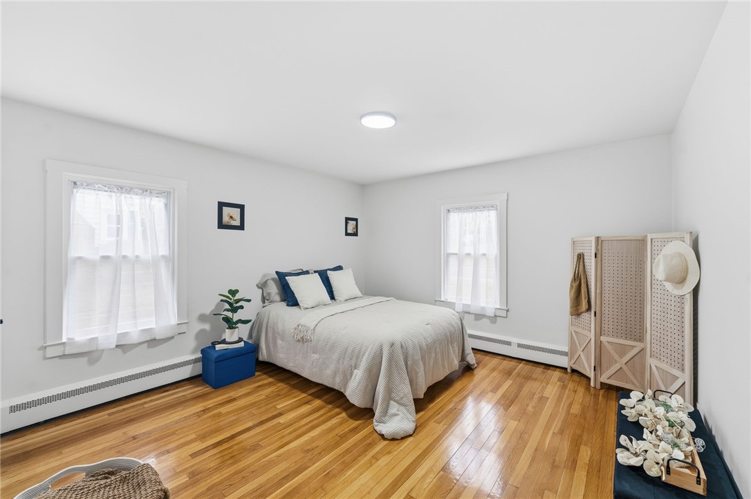 461 River Road Lincoln, RI 02865 - Photo 11 of 30 Bedroom with hardwoods and deep closet