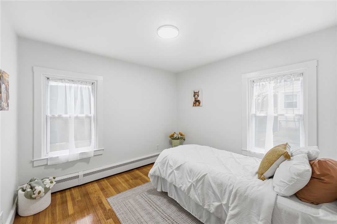 461 River Road Lincoln, RI 02865 - Photo 14 of 30 Back bedroom with hardwoods and single closet