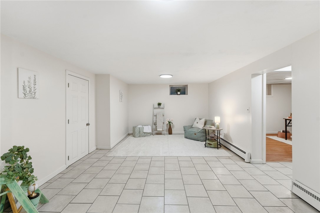 461 River Road Lincoln, RI 02865 - Photo 19 of 30 Finished basement offers flex space for a rec room, playroom, fitness area - whatever you need!