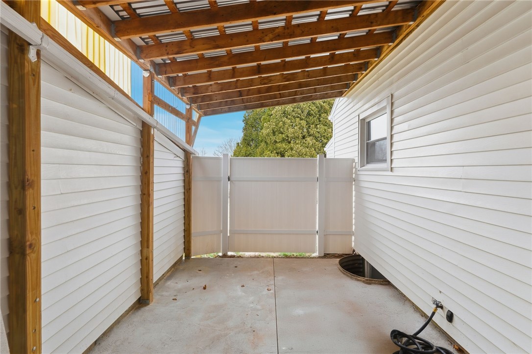 461 River Road Lincoln, RI 02865 - Photo 22 of 30 Covered patio area