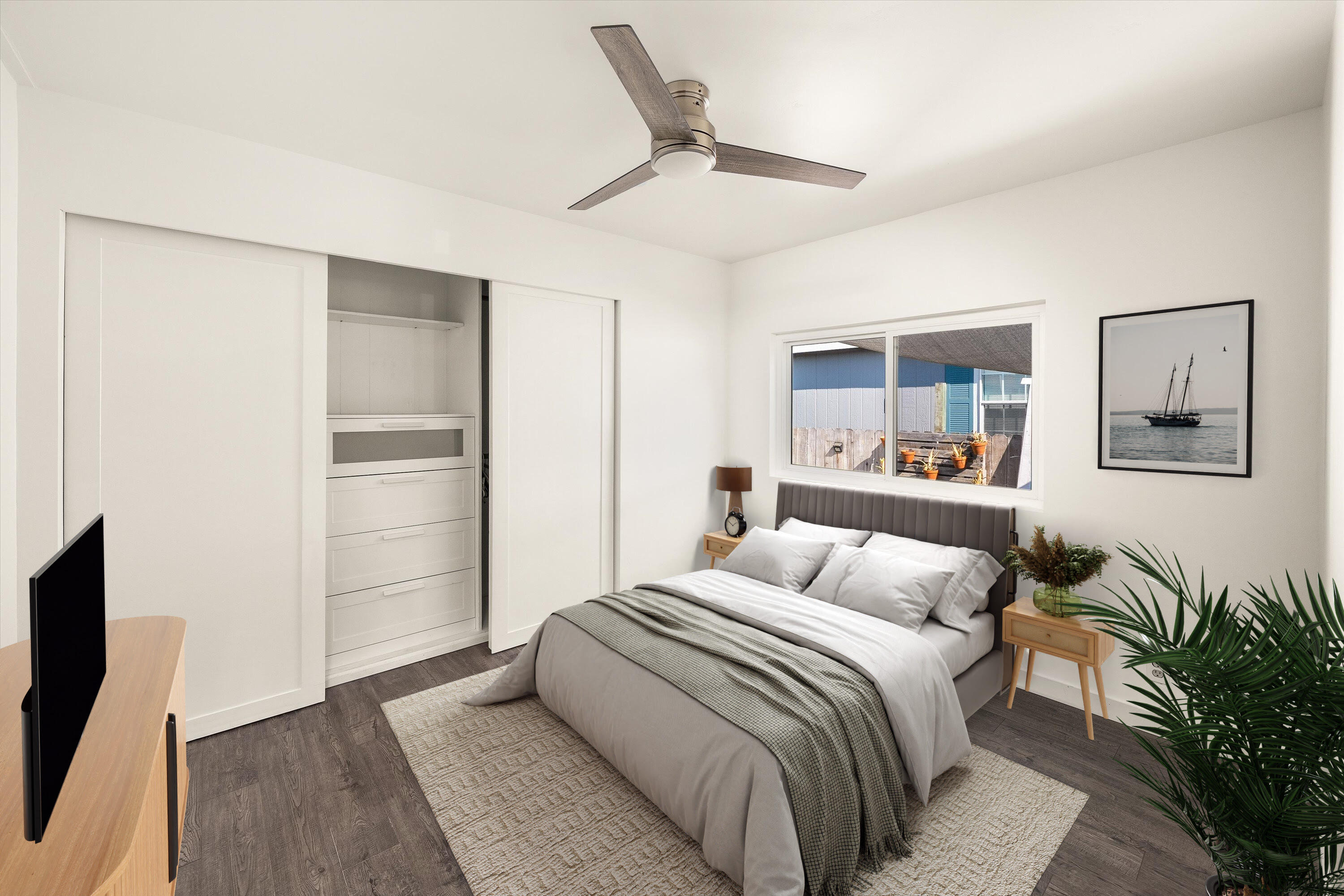 5700 Via Real, Unit 75 Carpinteria, CA 93013 - Photo 8 of 20 a bedroom with a large bed and a ceiling fan