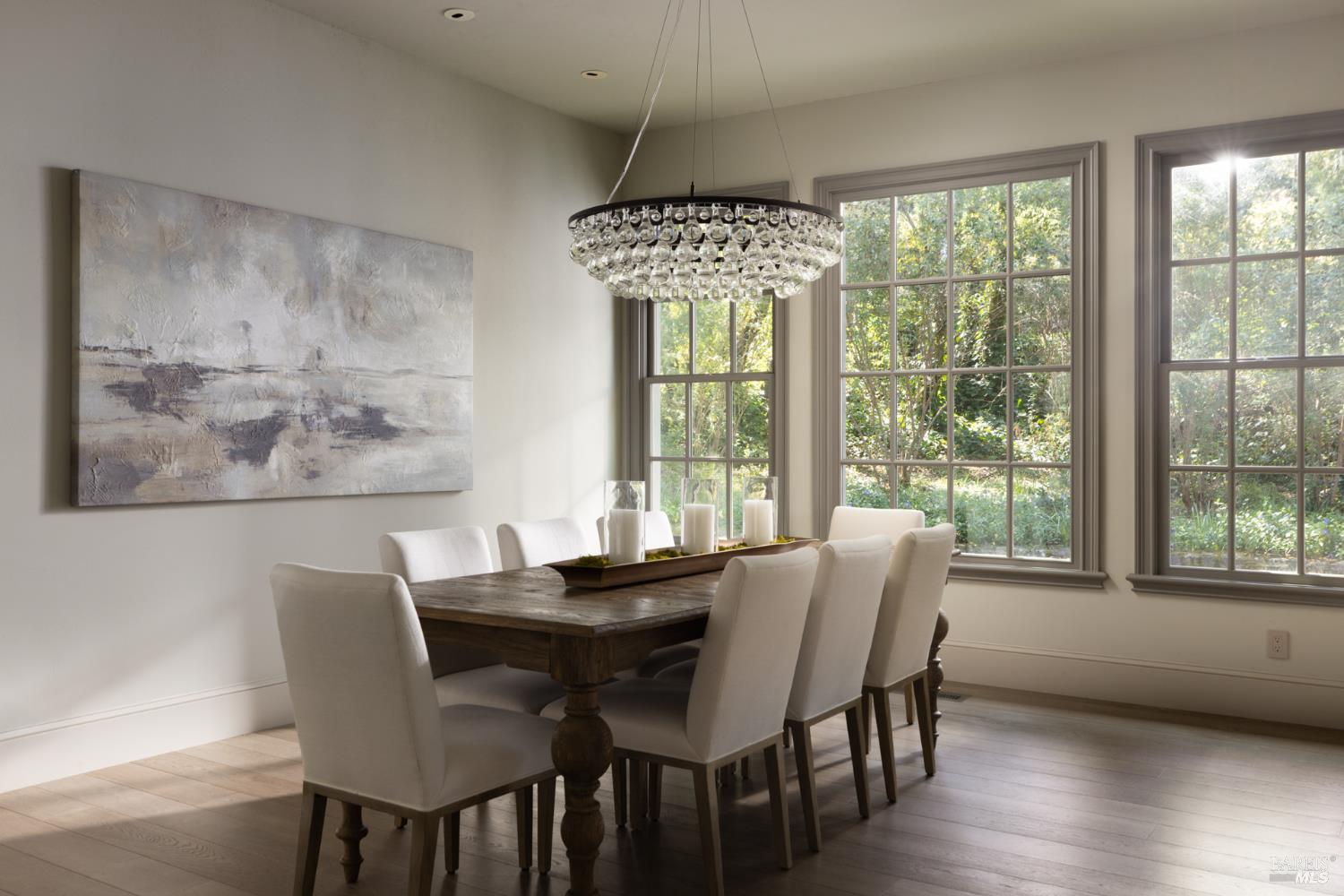 4504 Redwood Road Napa, CA 94558 - Photo 13 of 57 a dining room with furniture wooden floor and a chandelier