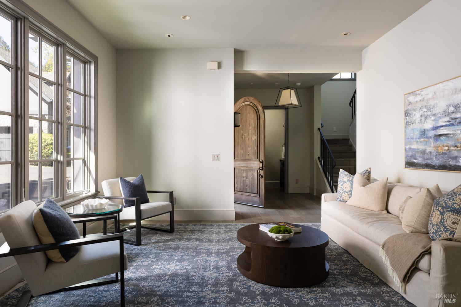 4504 Redwood Road Napa, CA 94558 - Photo 14 of 57 a living room with furniture and a potted plant
