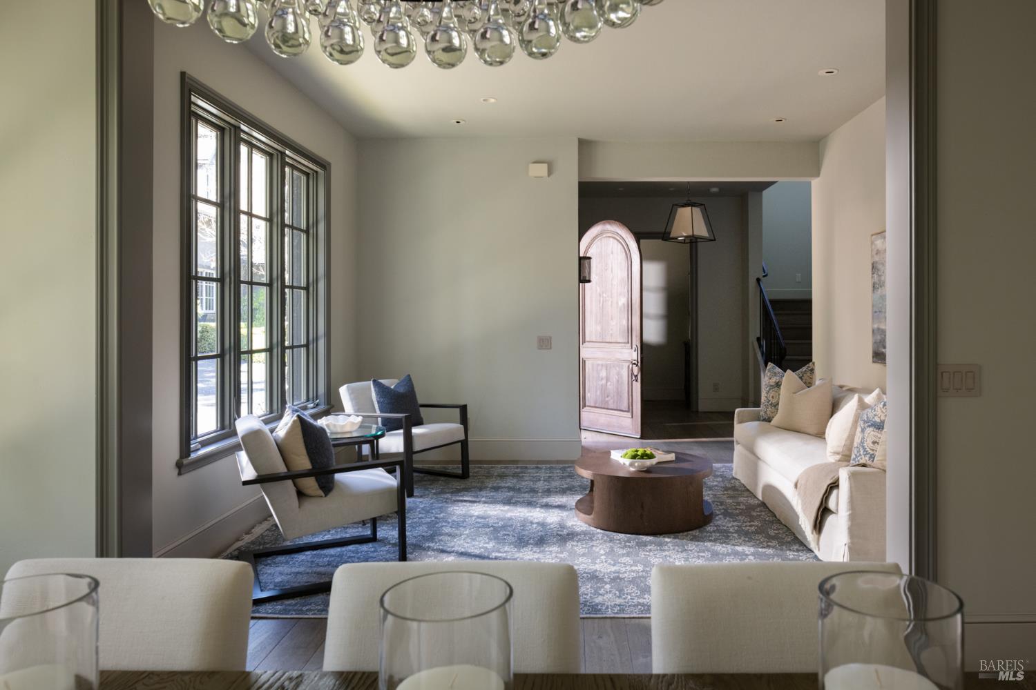 4504 Redwood Road Napa, CA 94558 - Photo 15 of 57 a living room with furniture and a potted plant