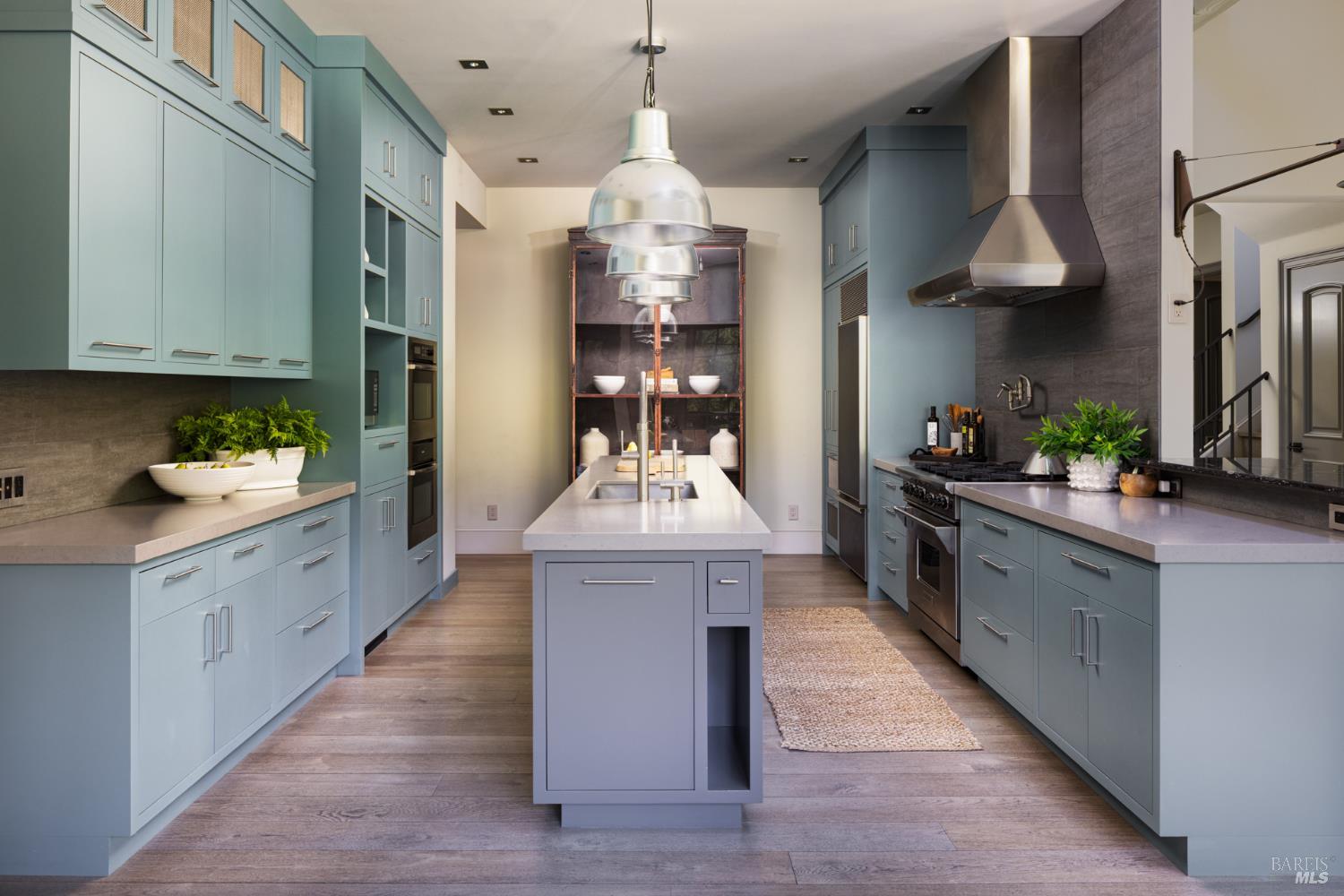 4504 Redwood Road Napa, CA 94558 - Photo 18 of 57 a kitchen with stainless steel appliances a stove oven and a refrigerator