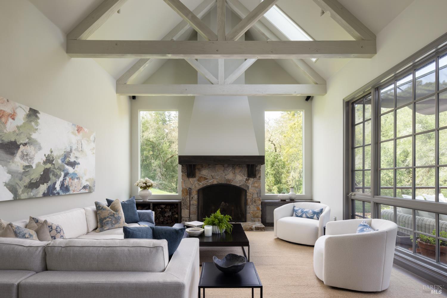4504 Redwood Road Napa, CA 94558 - Photo 20 of 57 a living room with furniture and a fireplace