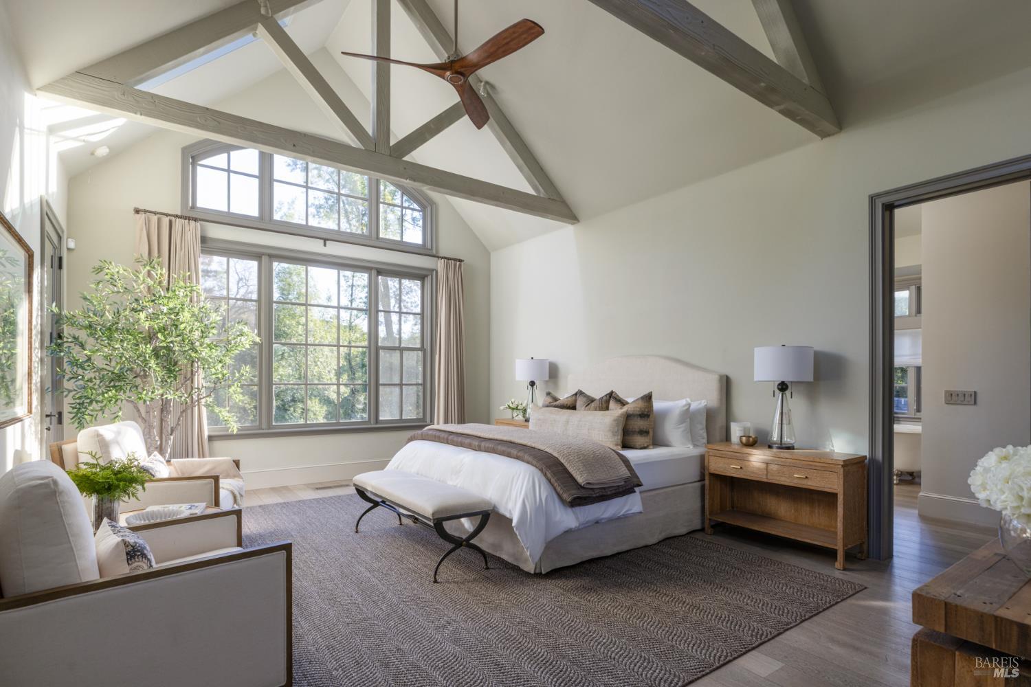 4504 Redwood Road Napa, CA 94558 - Photo 23 of 57 a bedroom with a bed couch and window