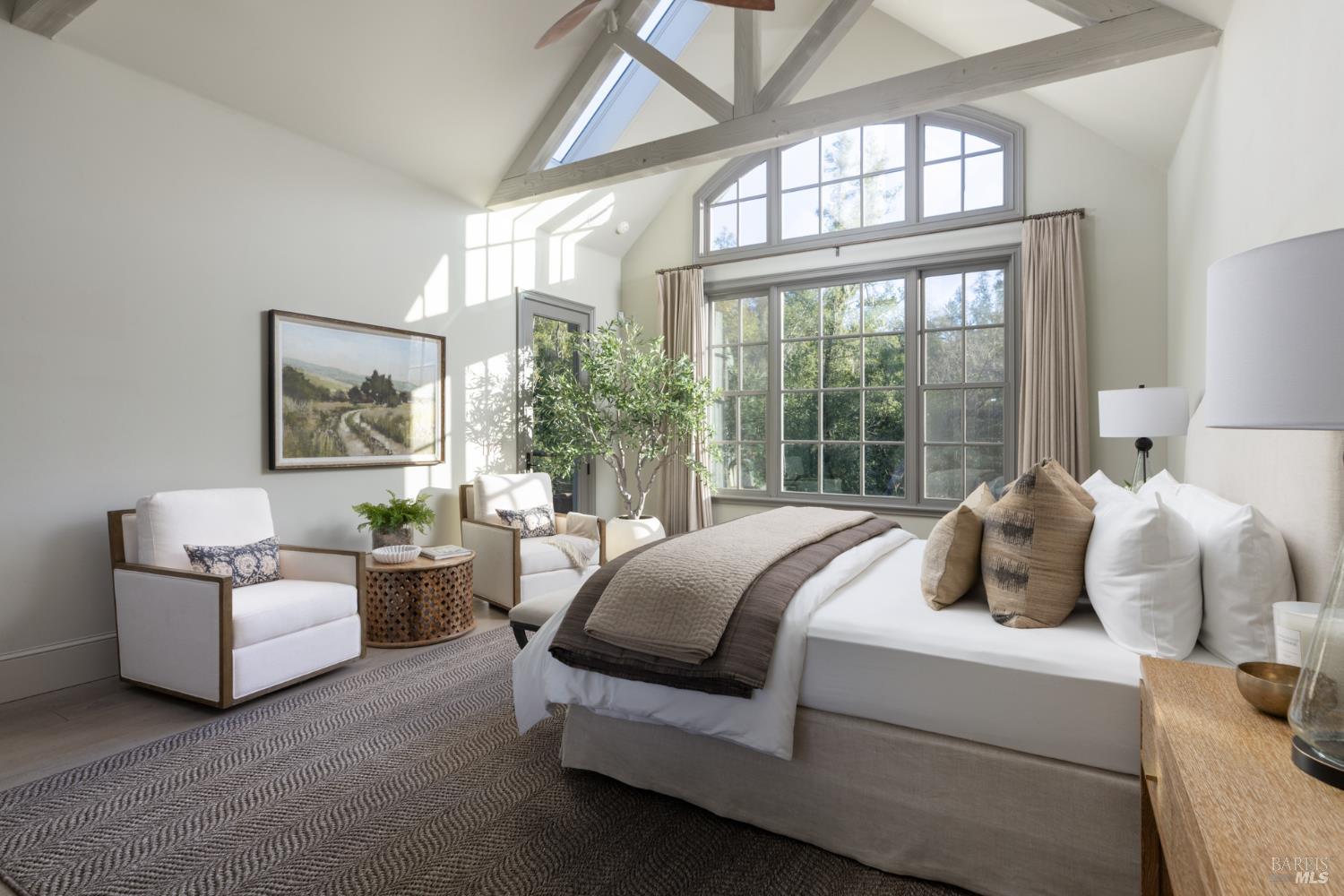 4504 Redwood Road Napa, CA 94558 - Photo 25 of 57 a bedroom with bed and a large window