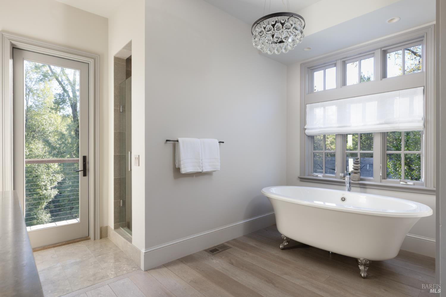 4504 Redwood Road Napa, CA 94558 - Photo 27 of 57 a spacious bathroom with a bathtub and a window