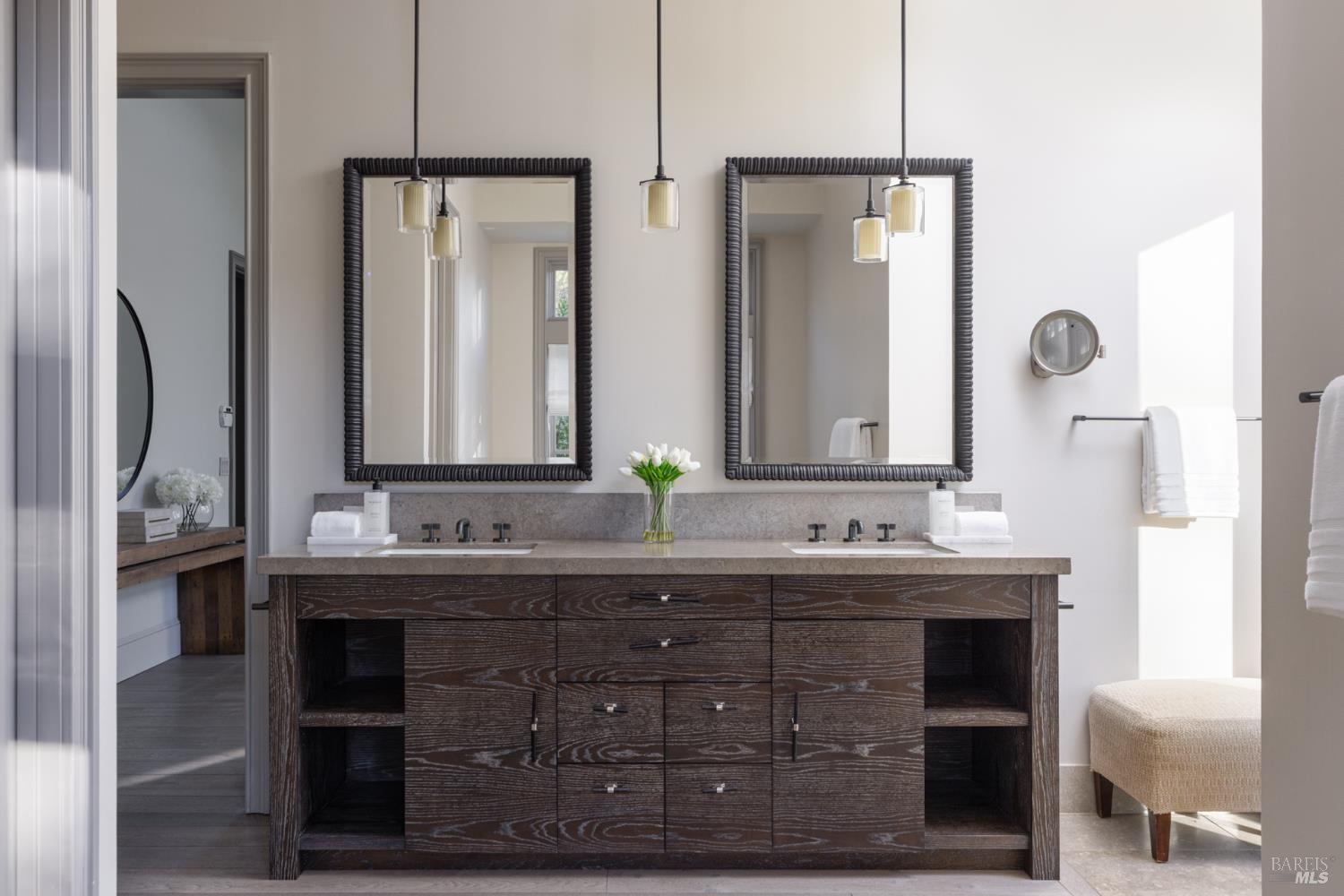 4504 Redwood Road Napa, CA 94558 - Photo 28 of 57 a bathroom with a double vanity sink and a mirror