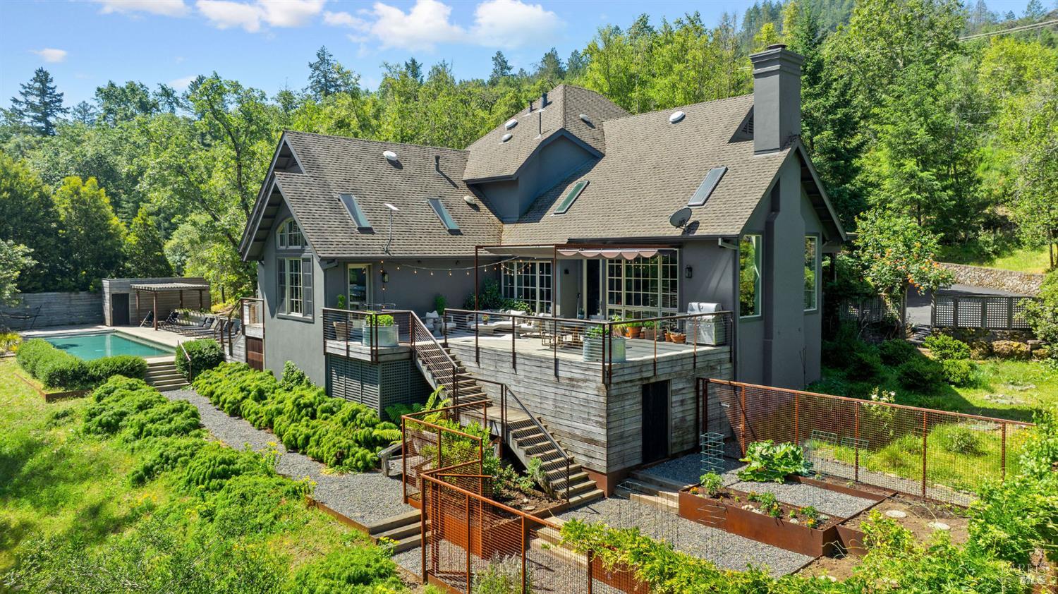 4504 Redwood Road Napa, CA 94558 - Photo 3 of 57 an aerial view of a house with table and chairs potted plants and large tree