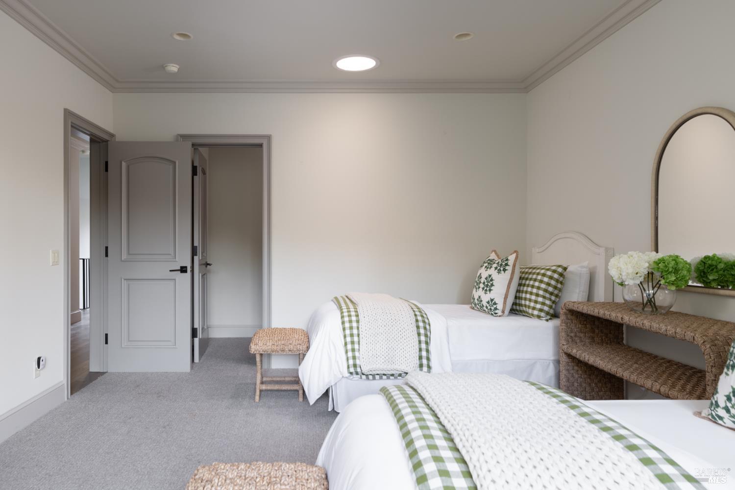 4504 Redwood Road Napa, CA 94558 - Photo 34 of 57 a bedroom with a bed and a potted plant