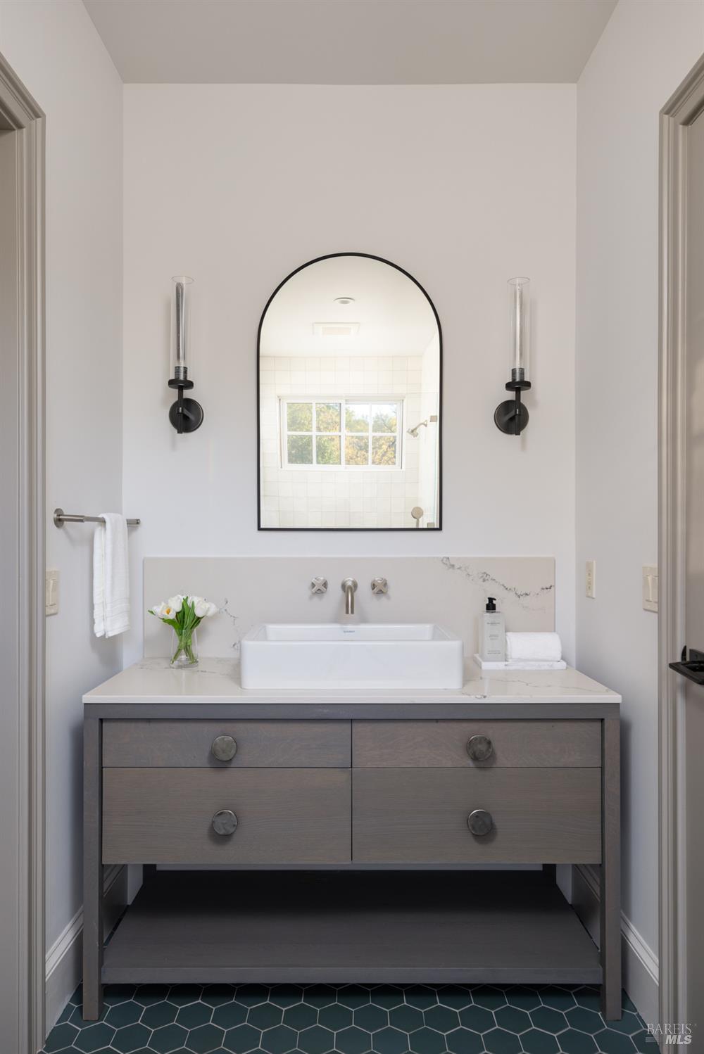 4504 Redwood Road Napa, CA 94558 - Photo 35 of 57 a bathroom with a sink and a mirror