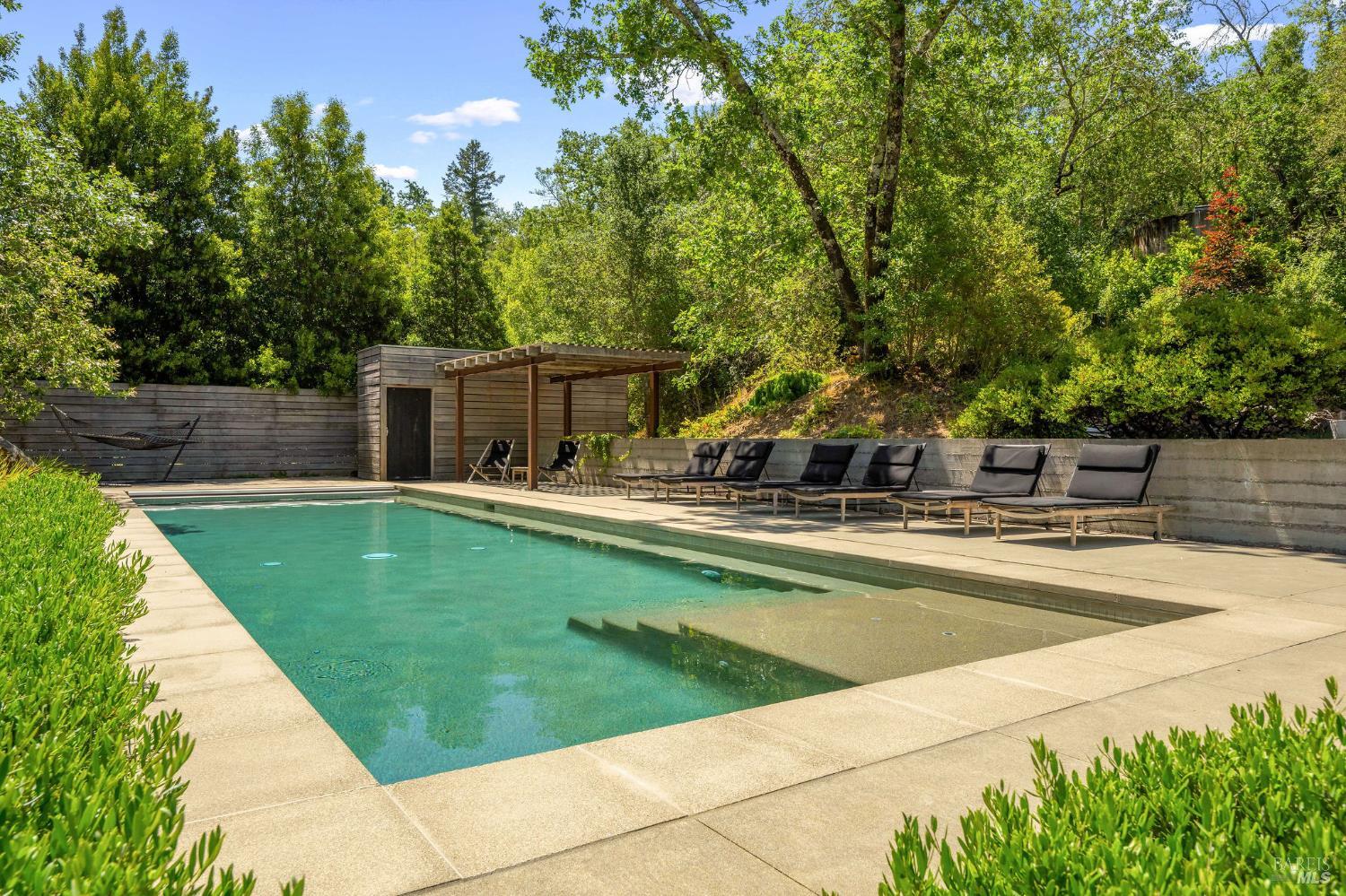 4504 Redwood Road Napa, CA 94558 - Photo 47 of 57 a view of a swimming pool with a patio