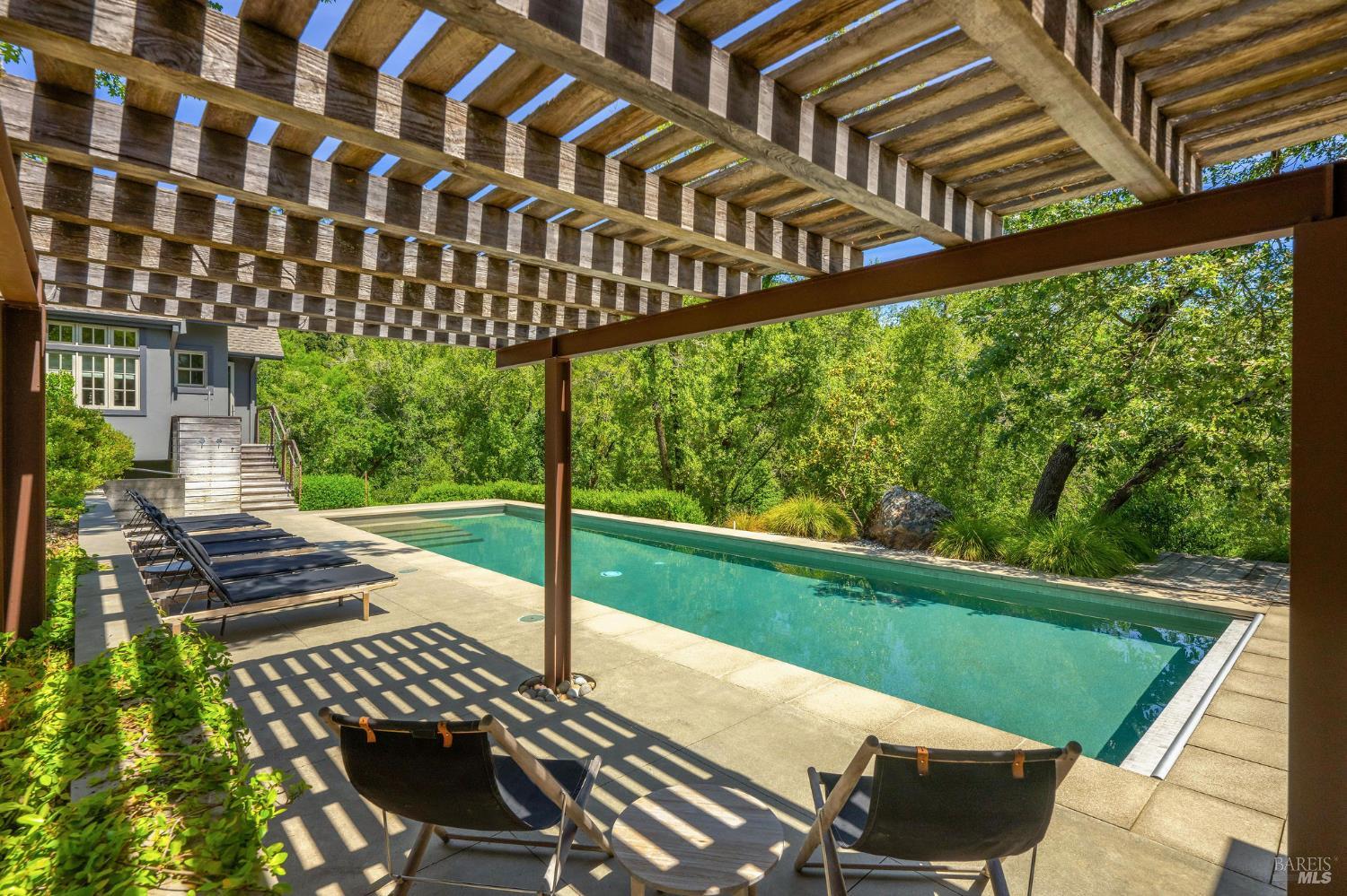 4504 Redwood Road Napa, CA 94558 - Photo 52 of 57 a view of a chair and tables in the balcony