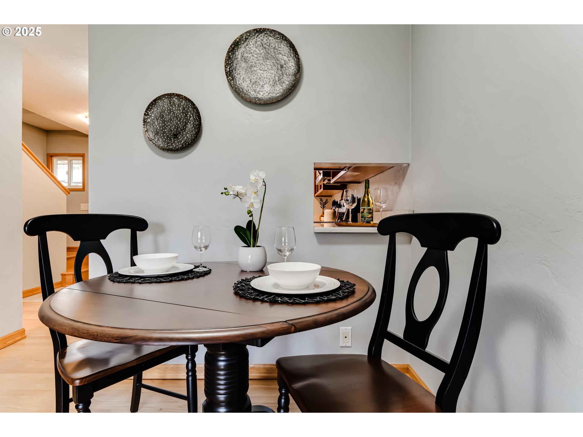 1555 Fetters Loop Eugene, OR 97402 - Photo 13 of 25 a view of a dining room with furniture and kitchen view