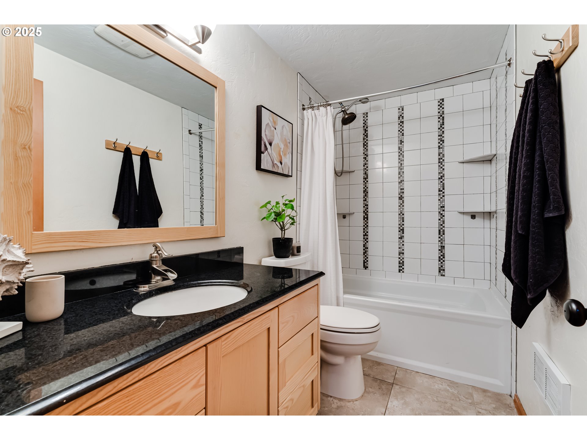 1555 Fetters Loop Eugene, OR 97402 - Photo 19 of 25 a bathroom with a granite countertop sink toilet and shower