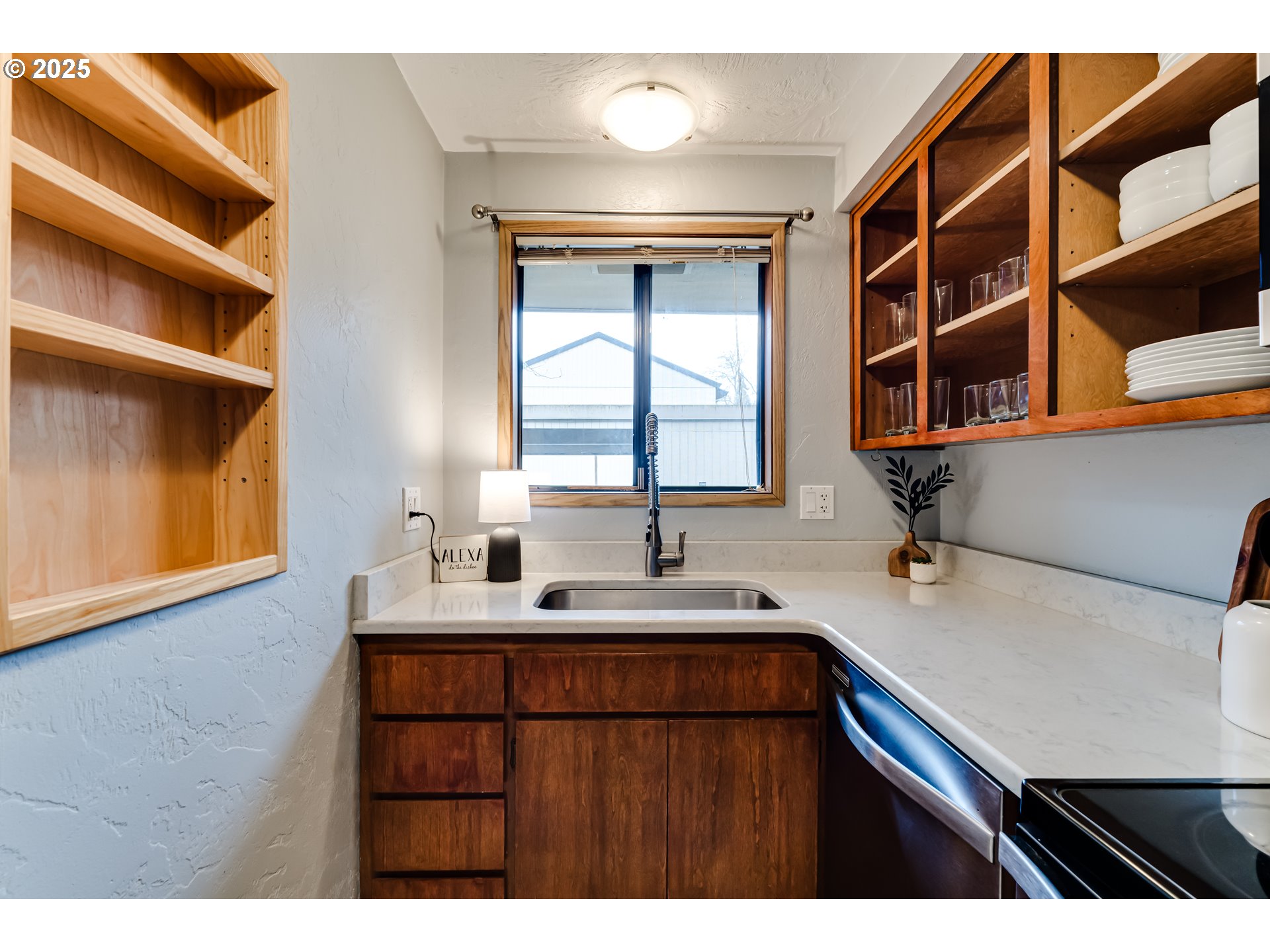 1555 Fetters Loop Eugene, OR 97402 - Photo 6 of 25 a kitchen with a sink and a window