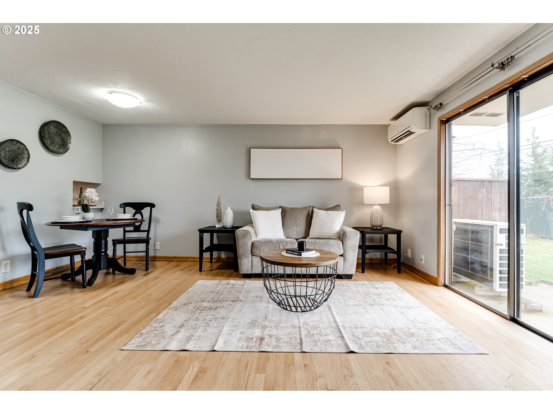 1555 Fetters Loop Eugene, OR 97402 - Photo 8 of 25 a living room with furniture and a wooden floor