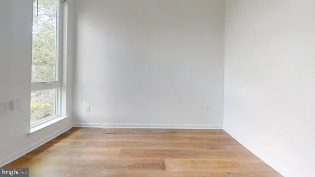 a view of an empty room and window