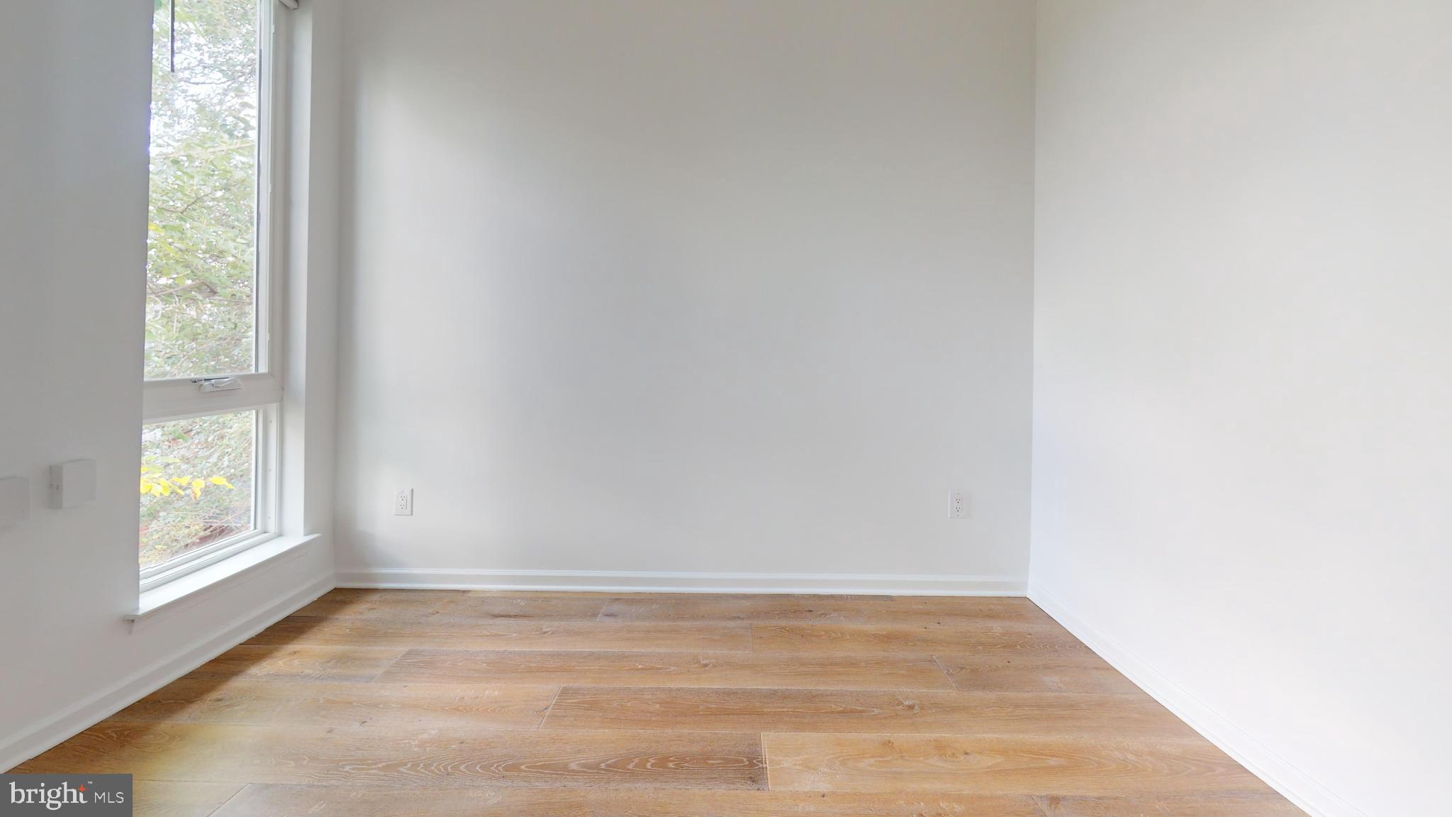5225 Walnut Street, Unit 4 Philadelphia, PA 19139 - Photo 4 of 5 a view of an empty room and window