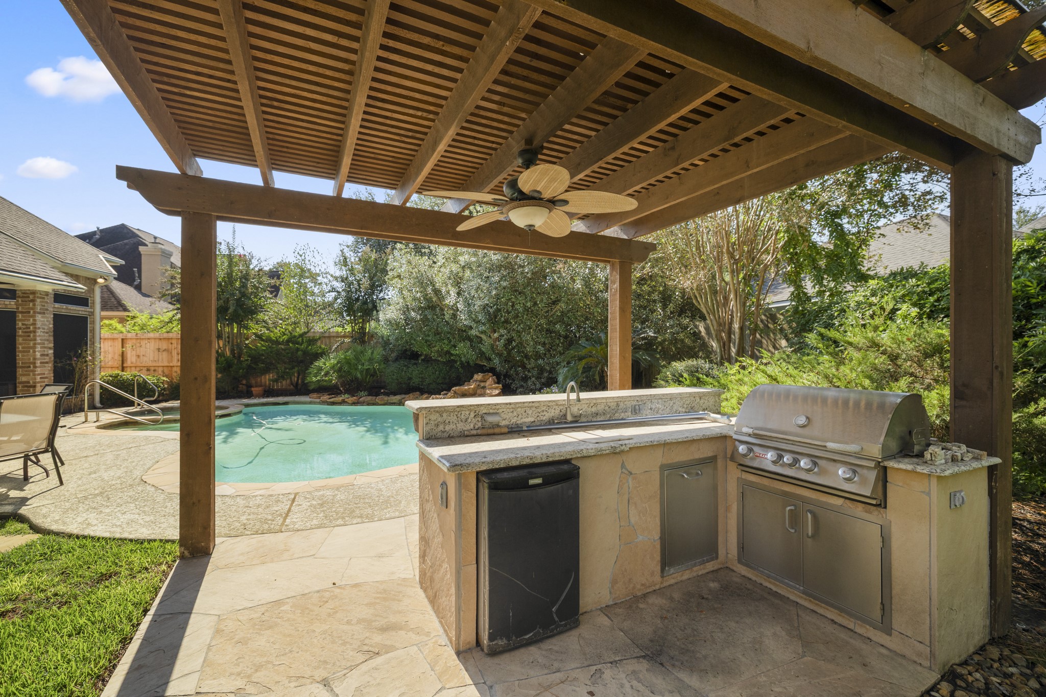 19315 Puget Lane Spring, TX 77388 - Photo 44 of 49 covered outdoor kitchen to cook your steaks