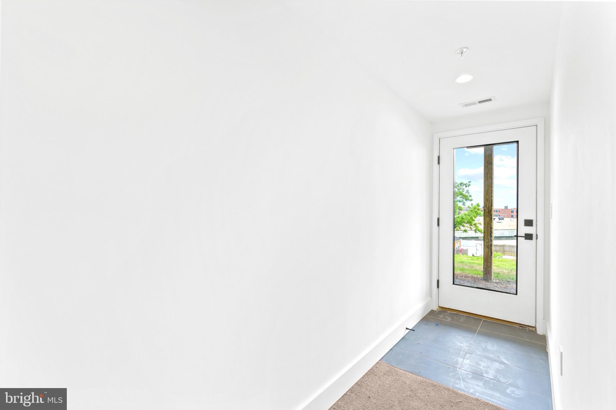 2305 Elvans Road Southeast Washington, DC 20020 - Photo 26 of 48 LOWER LEVEL FOYER