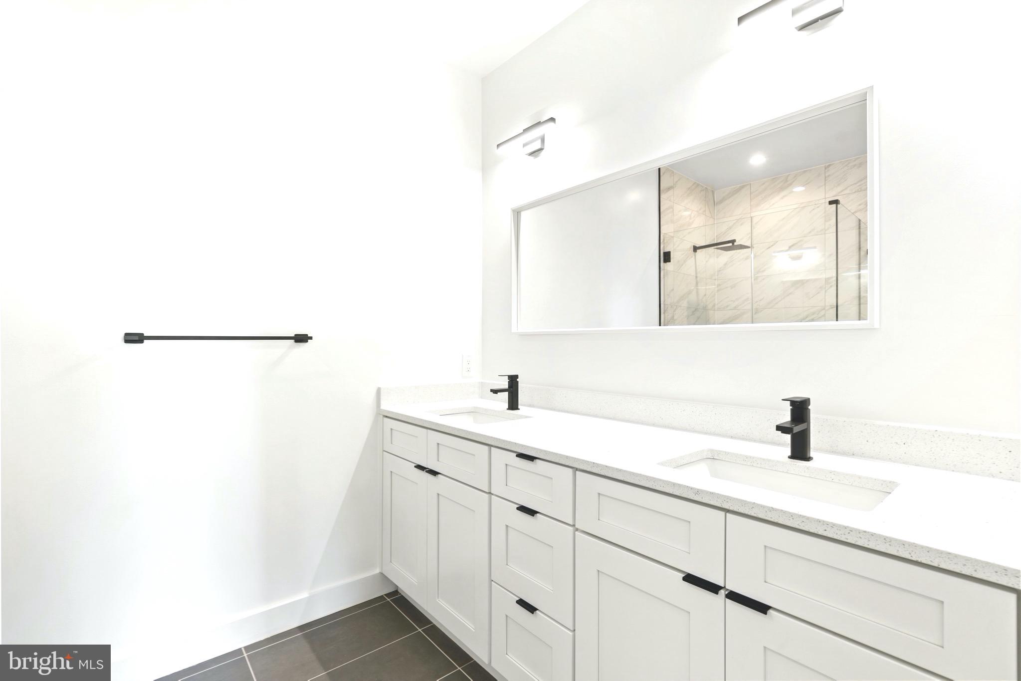 2305 Elvans Road Southeast Washington, DC 20020 - Photo 33 of 48 PRIMARY BEDROOM
ENSUITE DUAL SINK