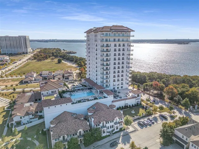 a front view of a building with sitting area
