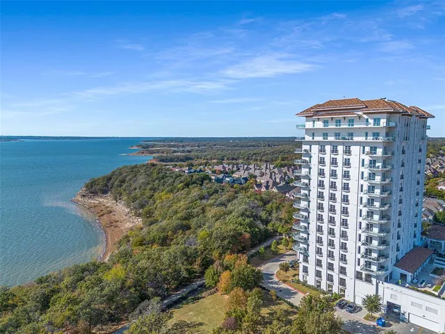 a view of a swimming pool with a lounge chairs