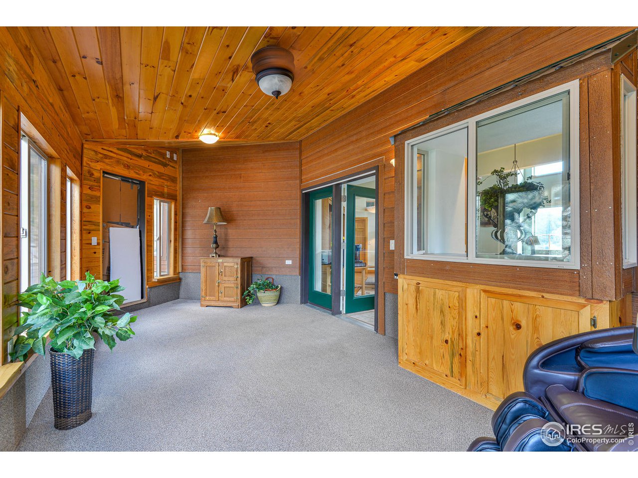 560 Stove Prairie Road Bellvue, CO 80512 - Photo 20 of 40 a view of an entryway with a garden