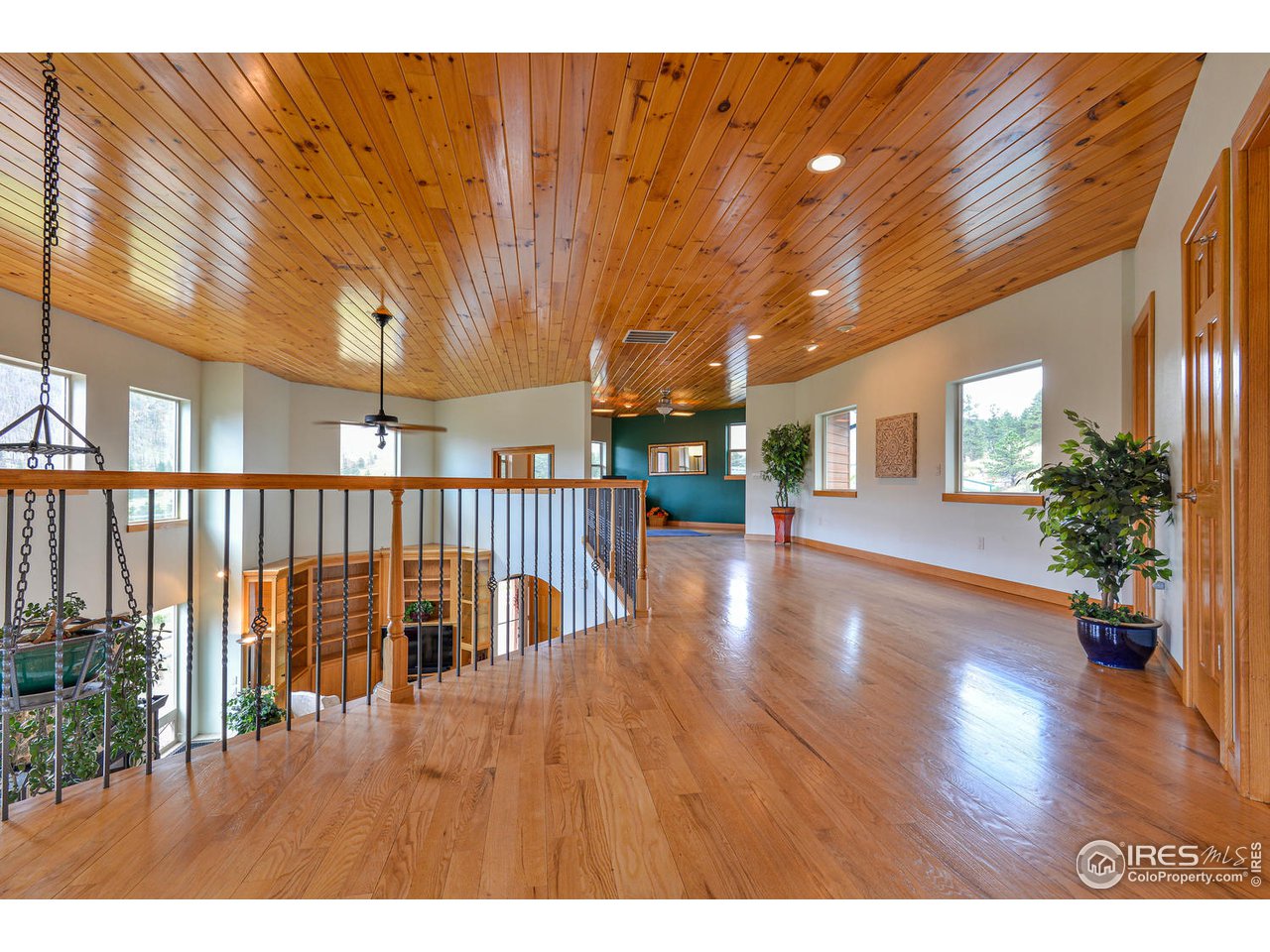 560 Stove Prairie Road Bellvue, CO 80512 - Photo 22 of 40 a view of an entryway with wooden floor