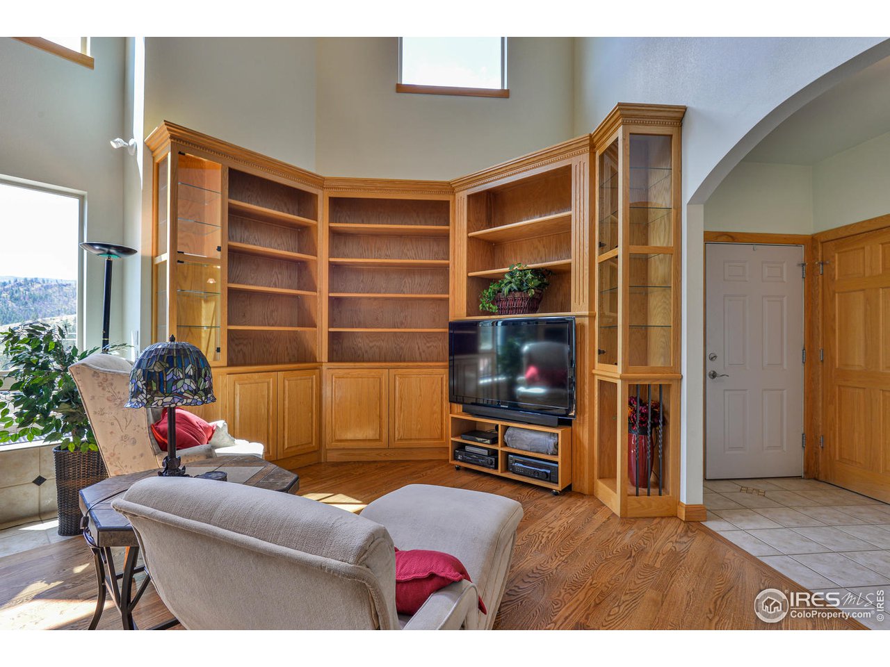560 Stove Prairie Road Bellvue, CO 80512 - Photo 8 of 40 a living room with furniture and a window