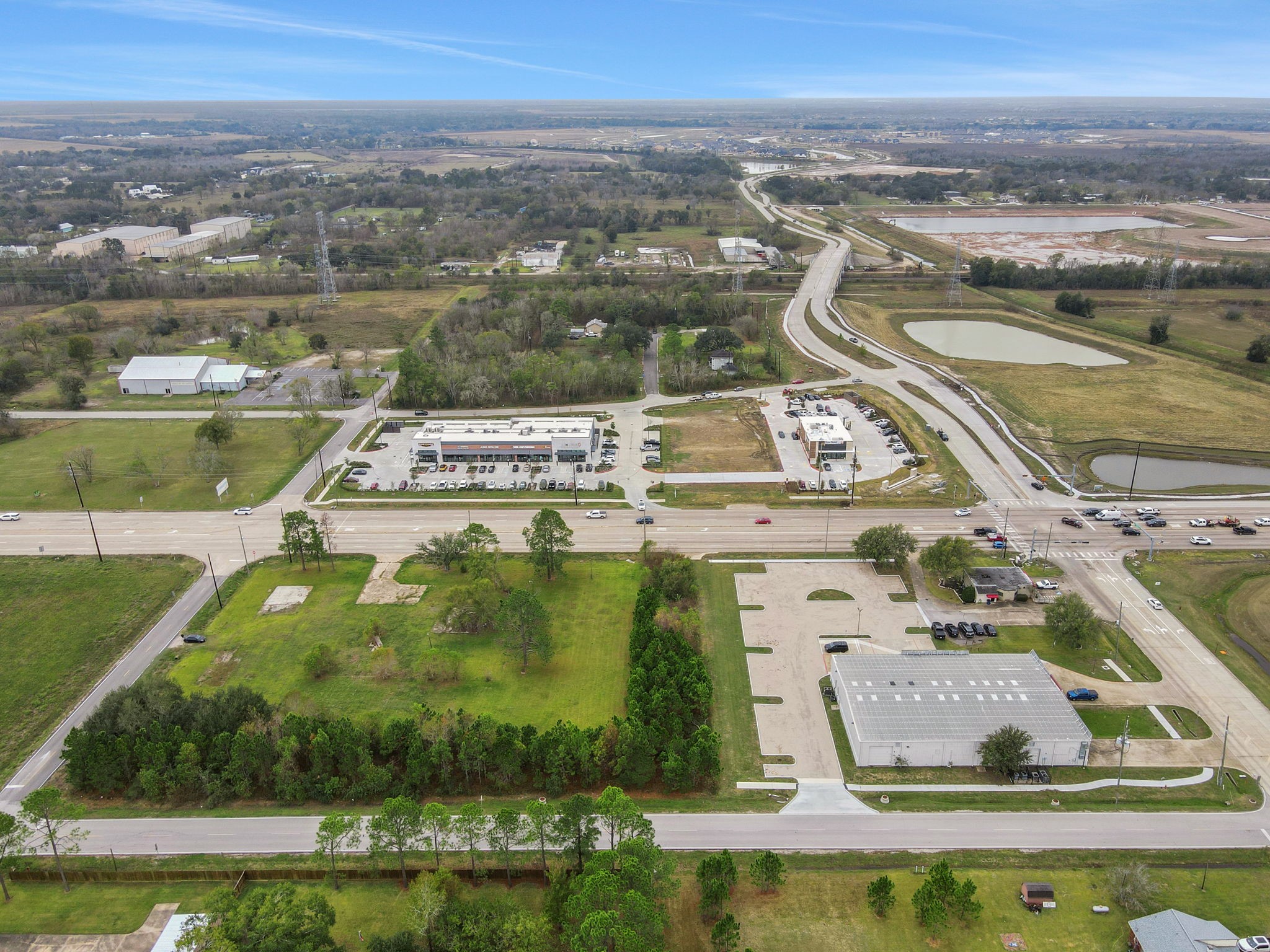 0 Morris Avenue Manvel, TX 77578 - Photo 7 of 11 an aerial view of residential houses with outdoor space
