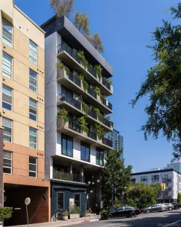 a front view of a building with street view and building