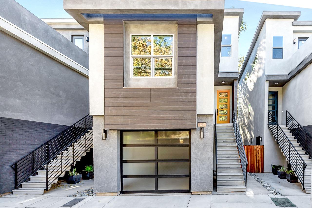 a front view of a house with a garage