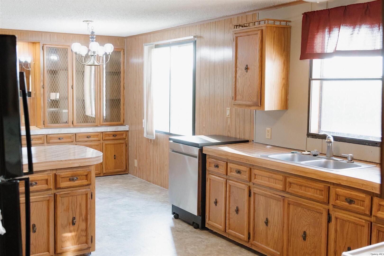 2217 County Road 2000 North Camp Point, IL 62320 - Photo 4 of 7 a bathroom with a sink and a mirror