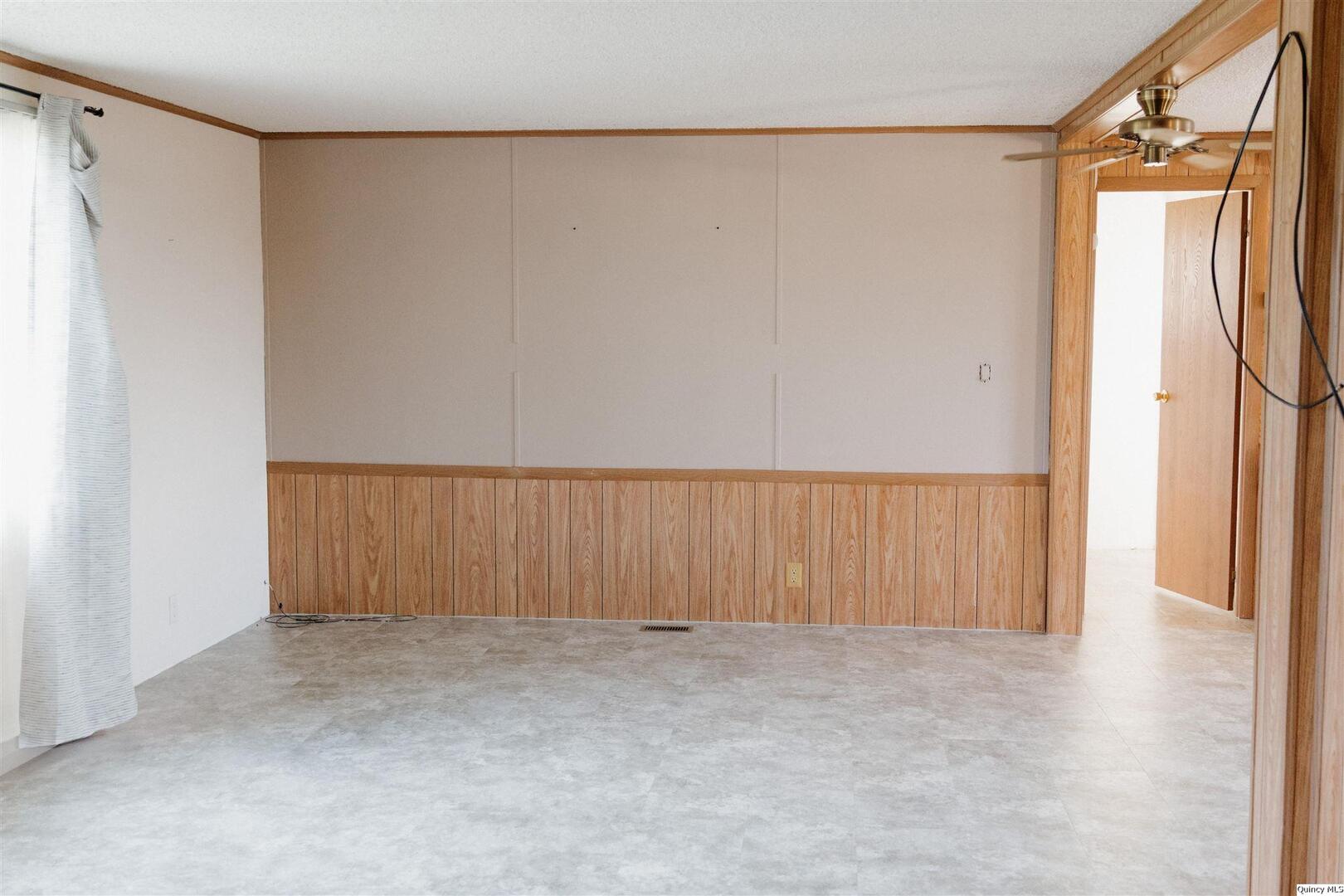 2217 County Road 2000 North Camp Point, IL 62320 - Photo 5 of 7 a view of an empty room