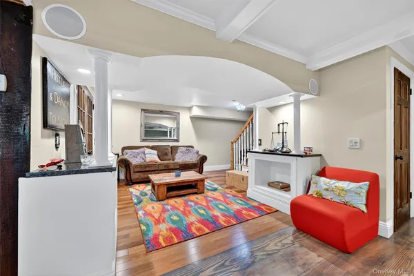 a living room with furniture and a table