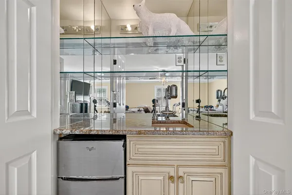 a bathroom with a bathtub and shower