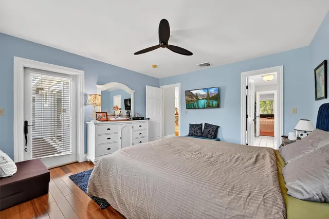 a bathroom with a sink a mirror and a shower