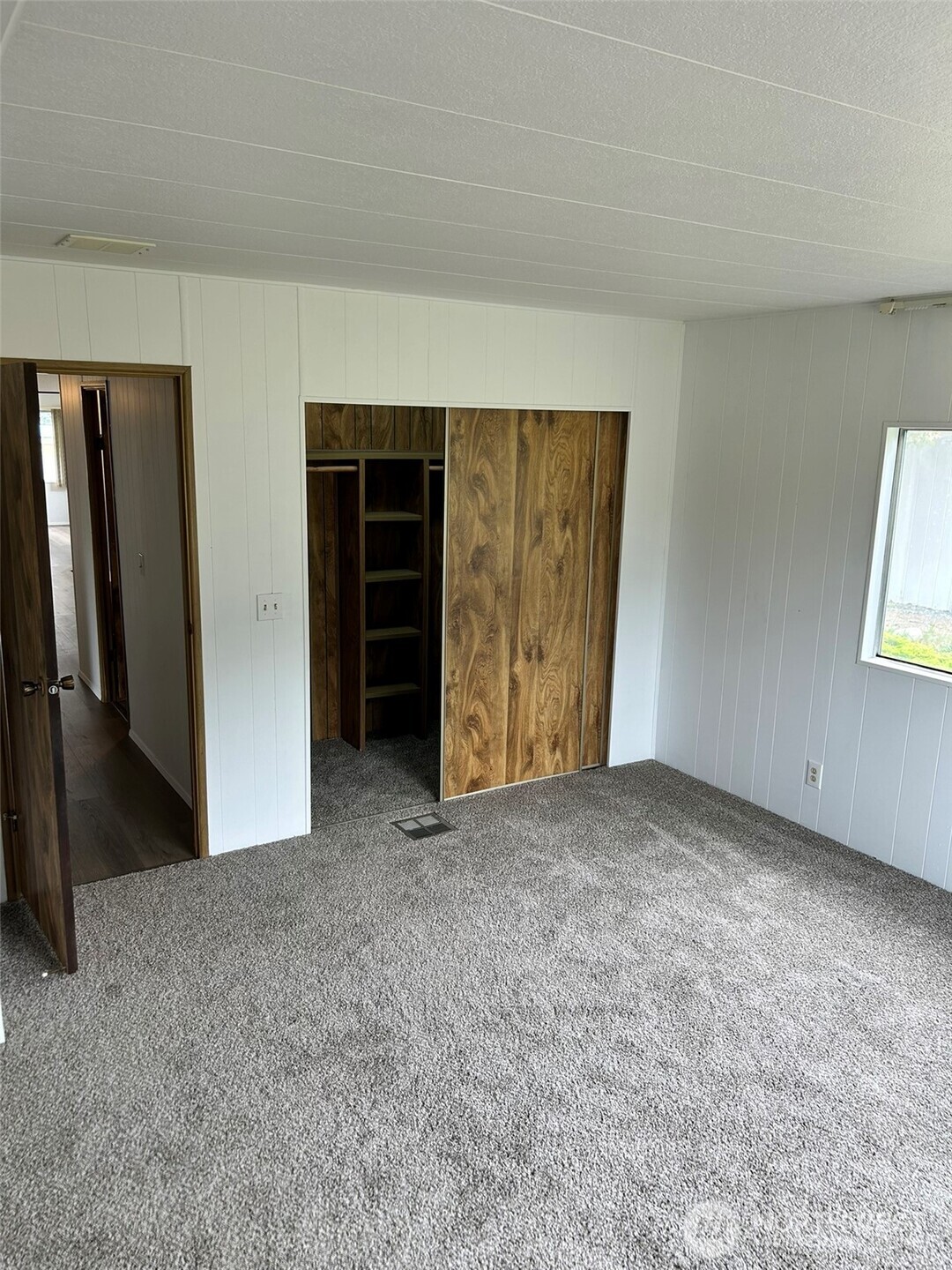 791 Elliot Court Sequim, WA 98382 - Photo 21 of 37 an empty room with windows