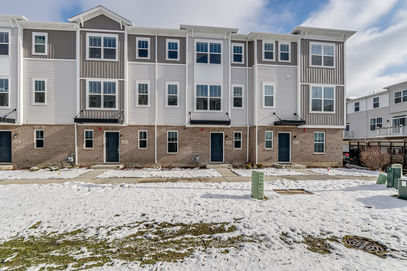 a view of a street with a building in front of it