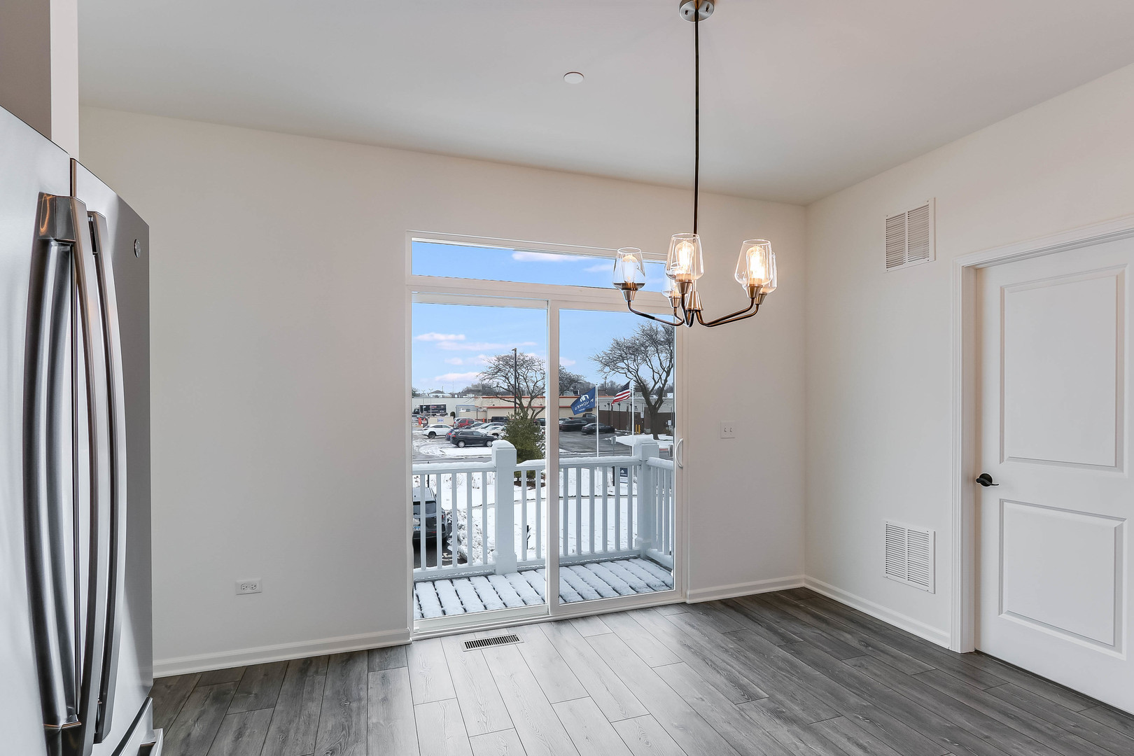 1552 Slade Way Des Plaines, IL 60018 - Photo 17 of 32 a view of a room with wooden floor