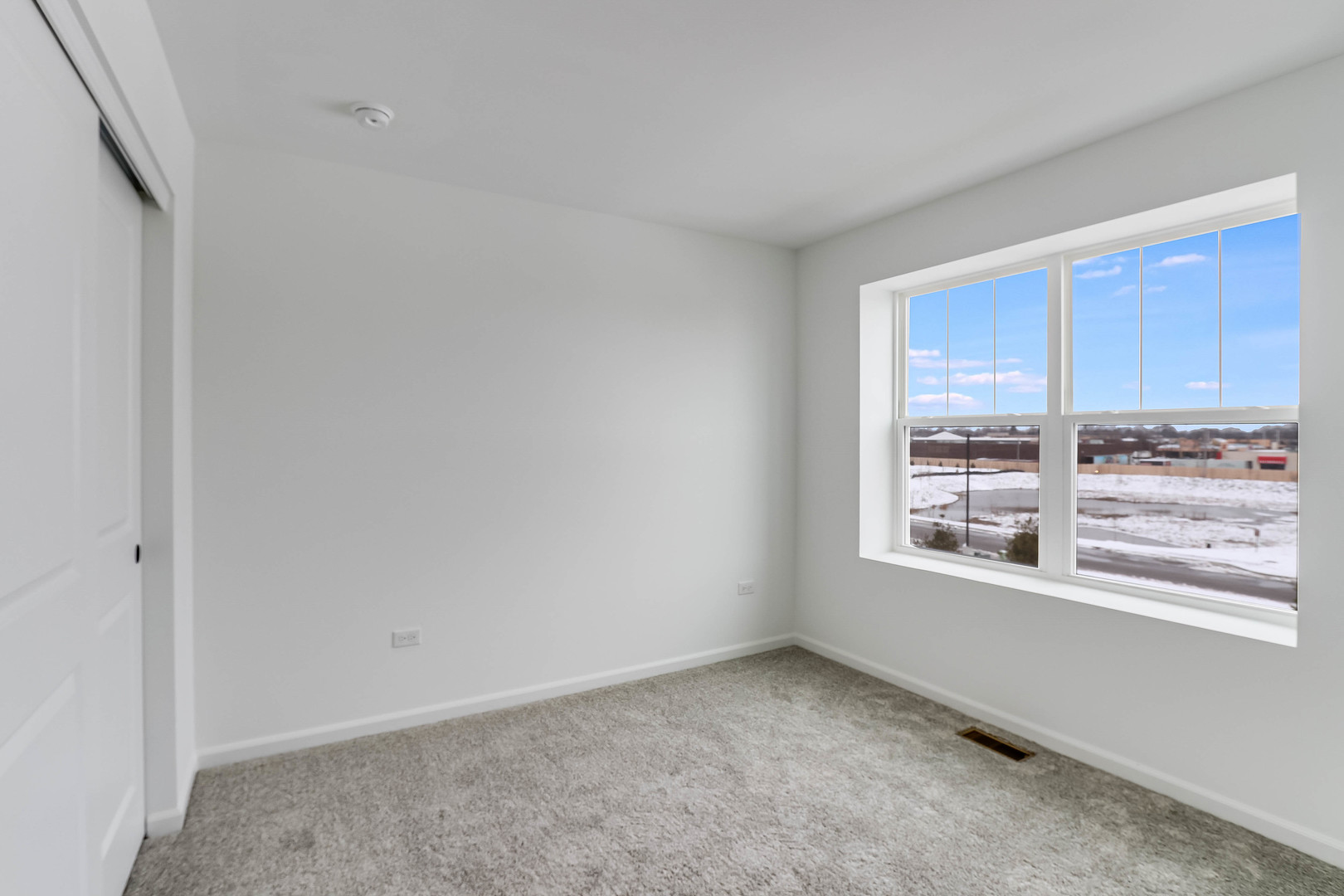 1552 Slade Way Des Plaines, IL 60018 - Photo 26 of 32 a view of an empty room with a window
